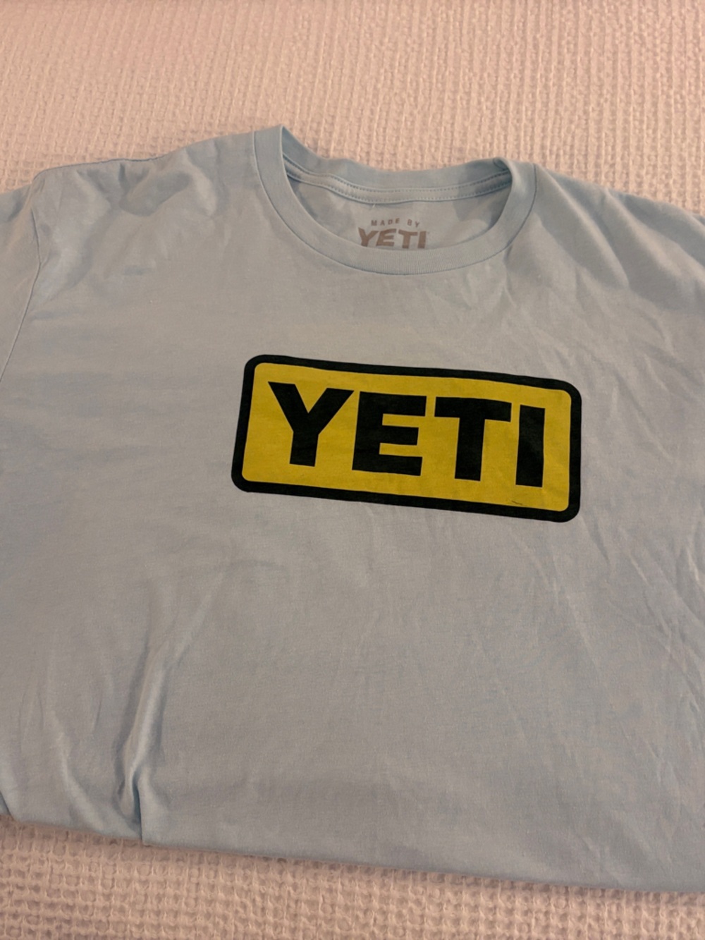 Yeti Light Blue Tee with Yellow and Black Logo